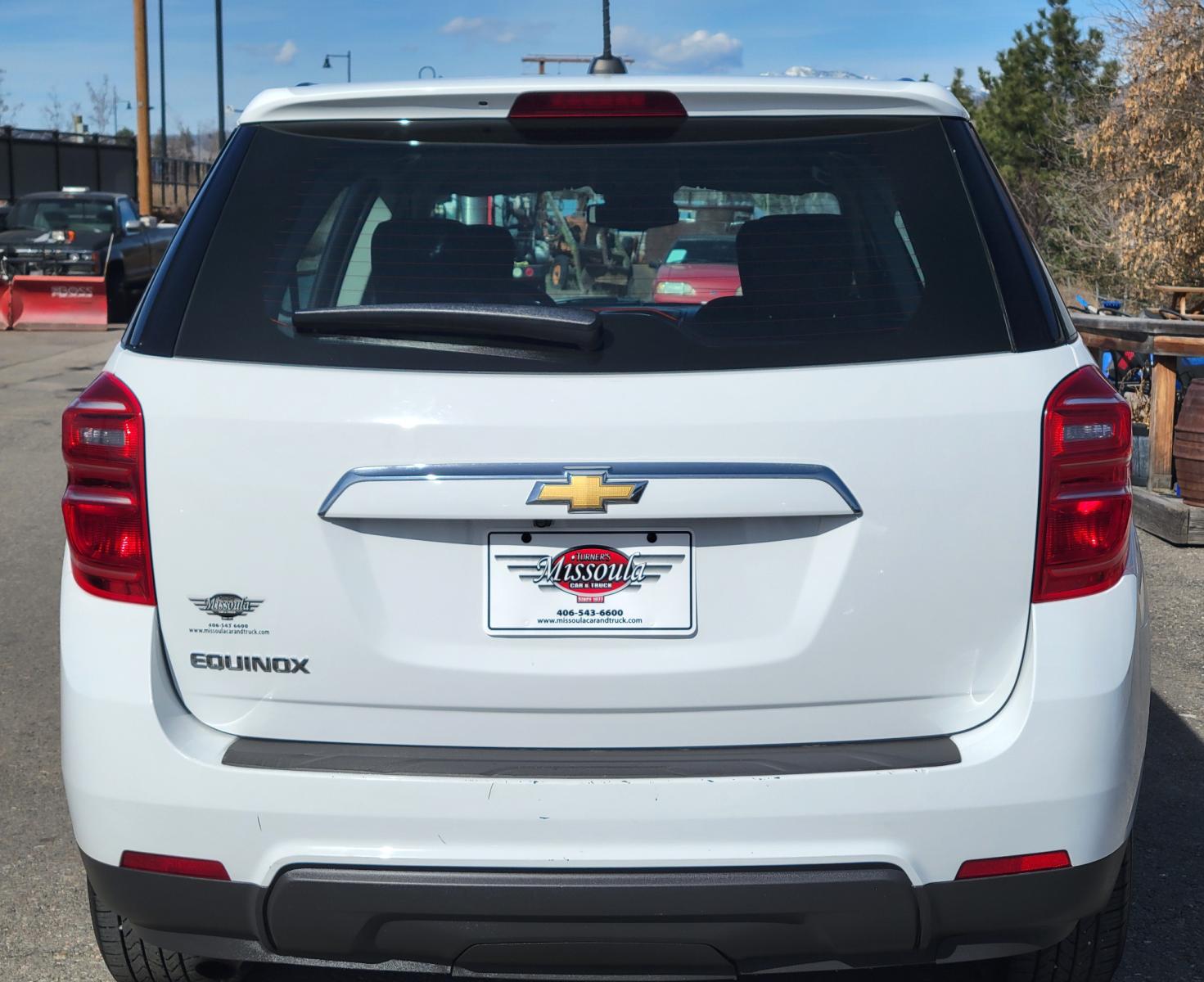 2017 White /Black Chevrolet Equinox LS 2WD (2GNALAEK3H1) with an 2.4L L4 DOHC 16V FFV engine, 6A transmission, located at 450 N Russell, Missoula, MT, 59801, (406) 543-6600, 46.874496, -114.017433 - Nice Front Wheel Drive SUV. 2.4L I4 Engine. 6 Speed Automatic Transmission. Bluetooth. Backup Camera. Air. Cruise. Tilt. Power Windows and Locks. - Photo #2